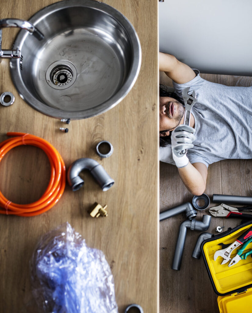 man fixing kitchen sink 2025 02 10 05 43 32 utc Easy Resize.com